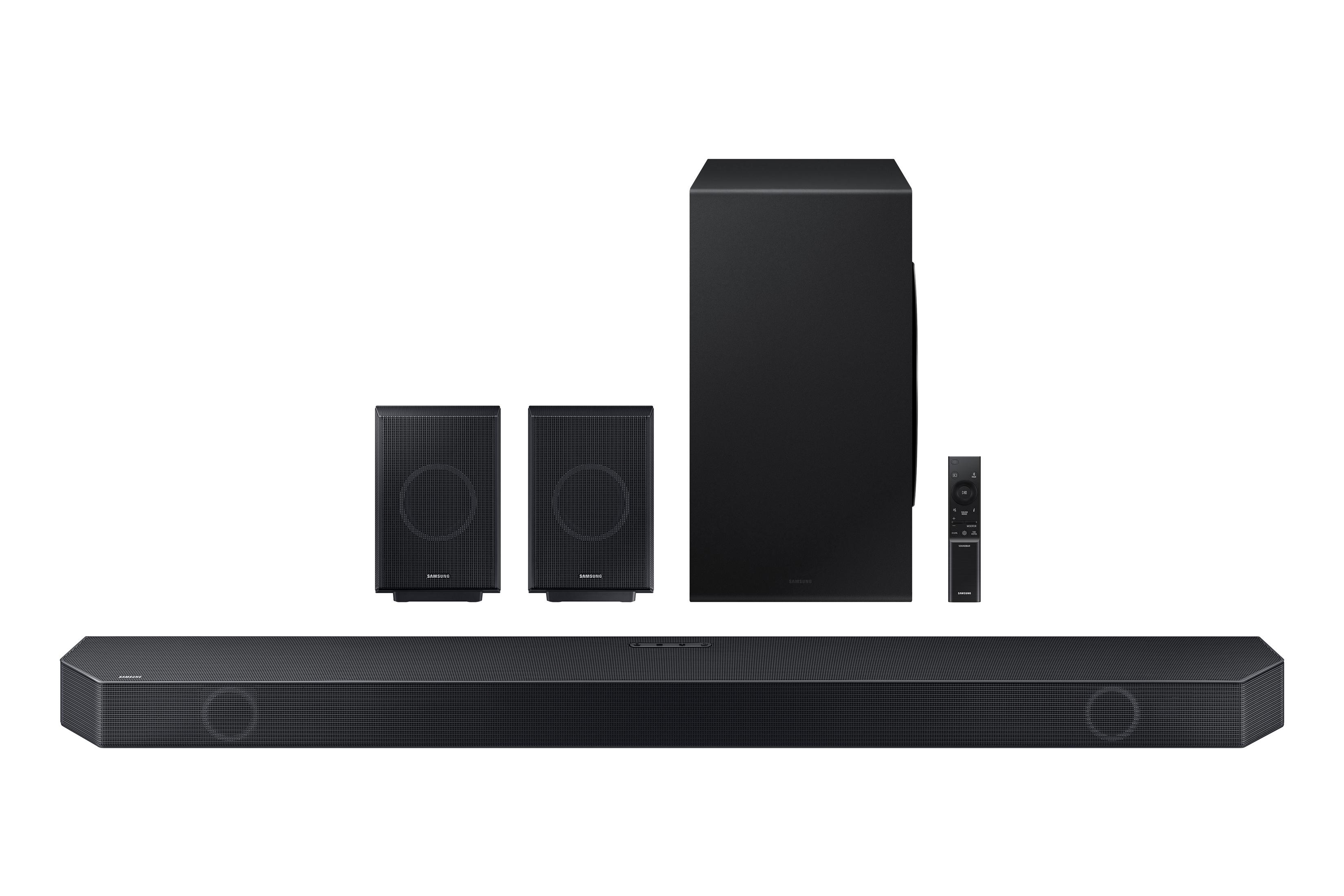 Schwarze Soundbar, Subwoofer, zwei Lautsprecher und Fernbedienung.