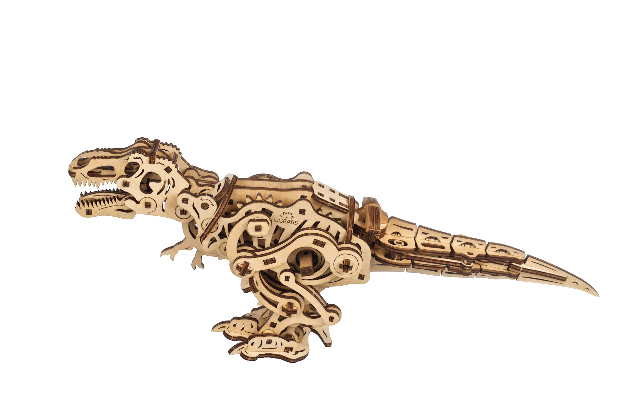 Un Tyrannosaurus Rex meccanico di legno su sfondo bianco.