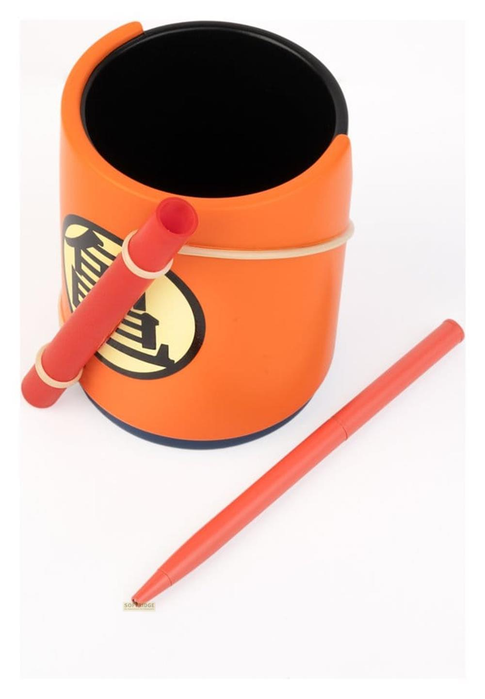 Orangeer Behälter mit einem Symbol, zwei rote Stifte und Gummibänder.