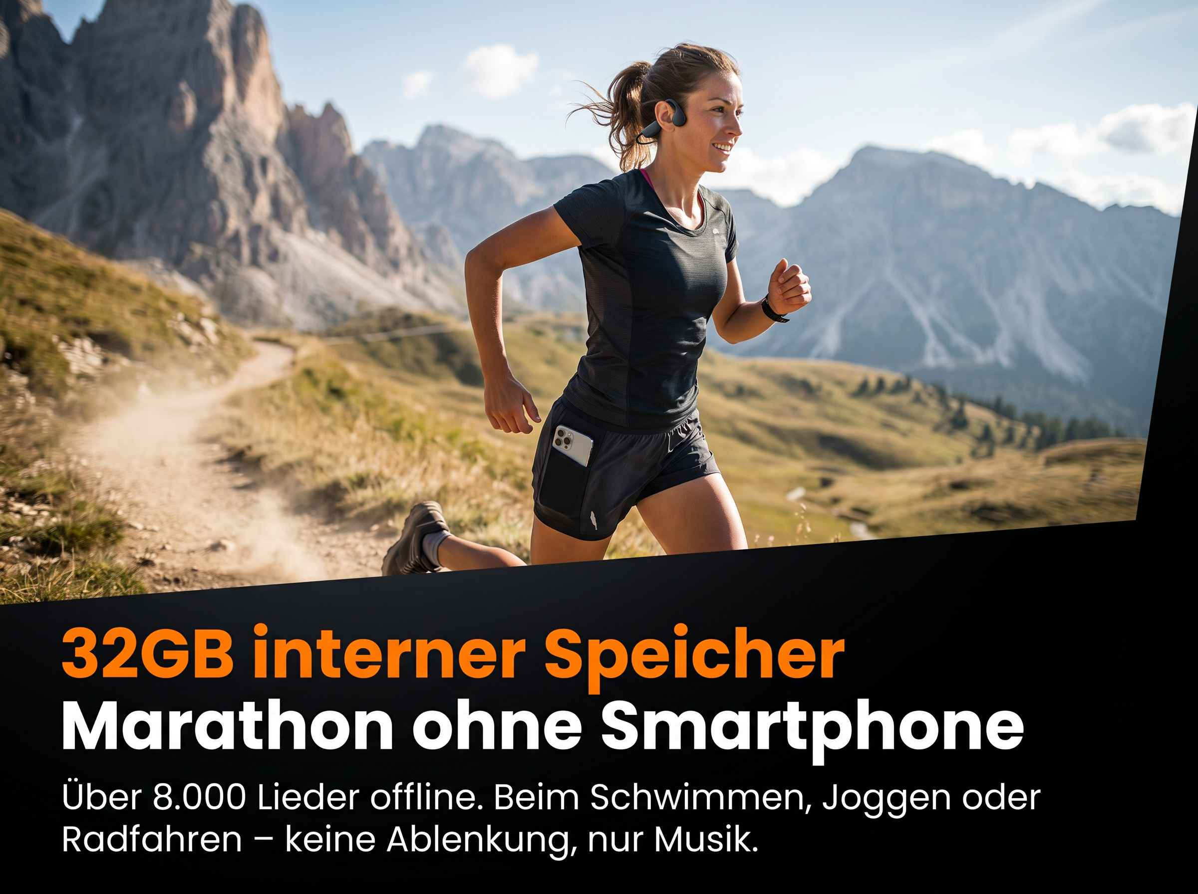 Läuferin mit Kopfhörern in Berglandschaft, Smartphone in Shorts.