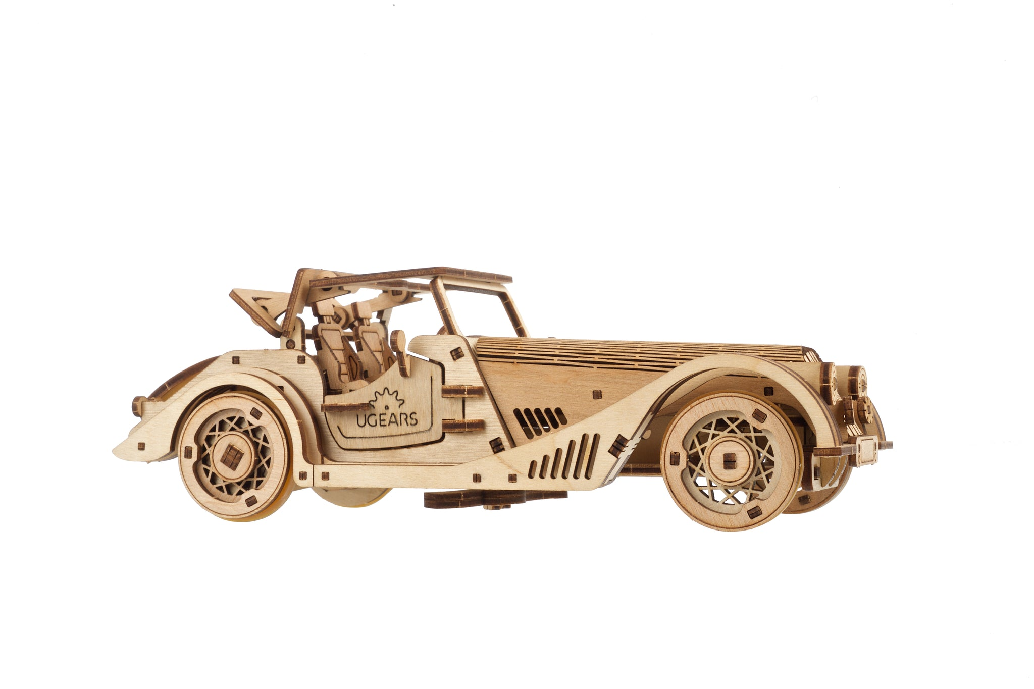 Modellino auto in legno con capote aperta, ruote e sedili dettagliati.