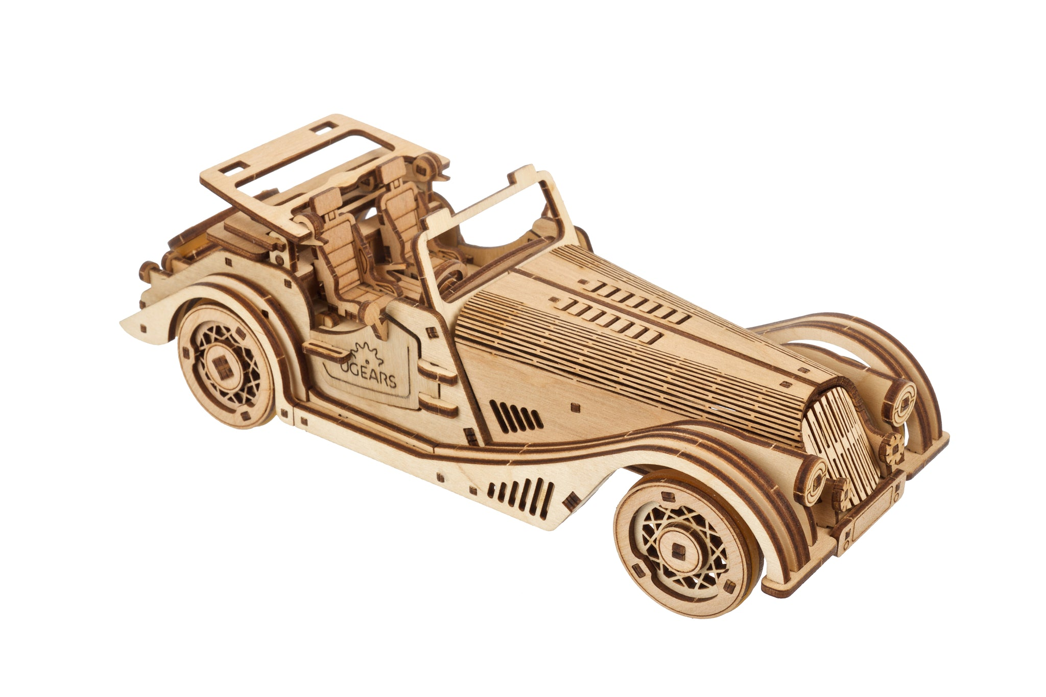 Un modello in legno di un'auto d'epoca convertibile con dettagli intricati e capote aperta.