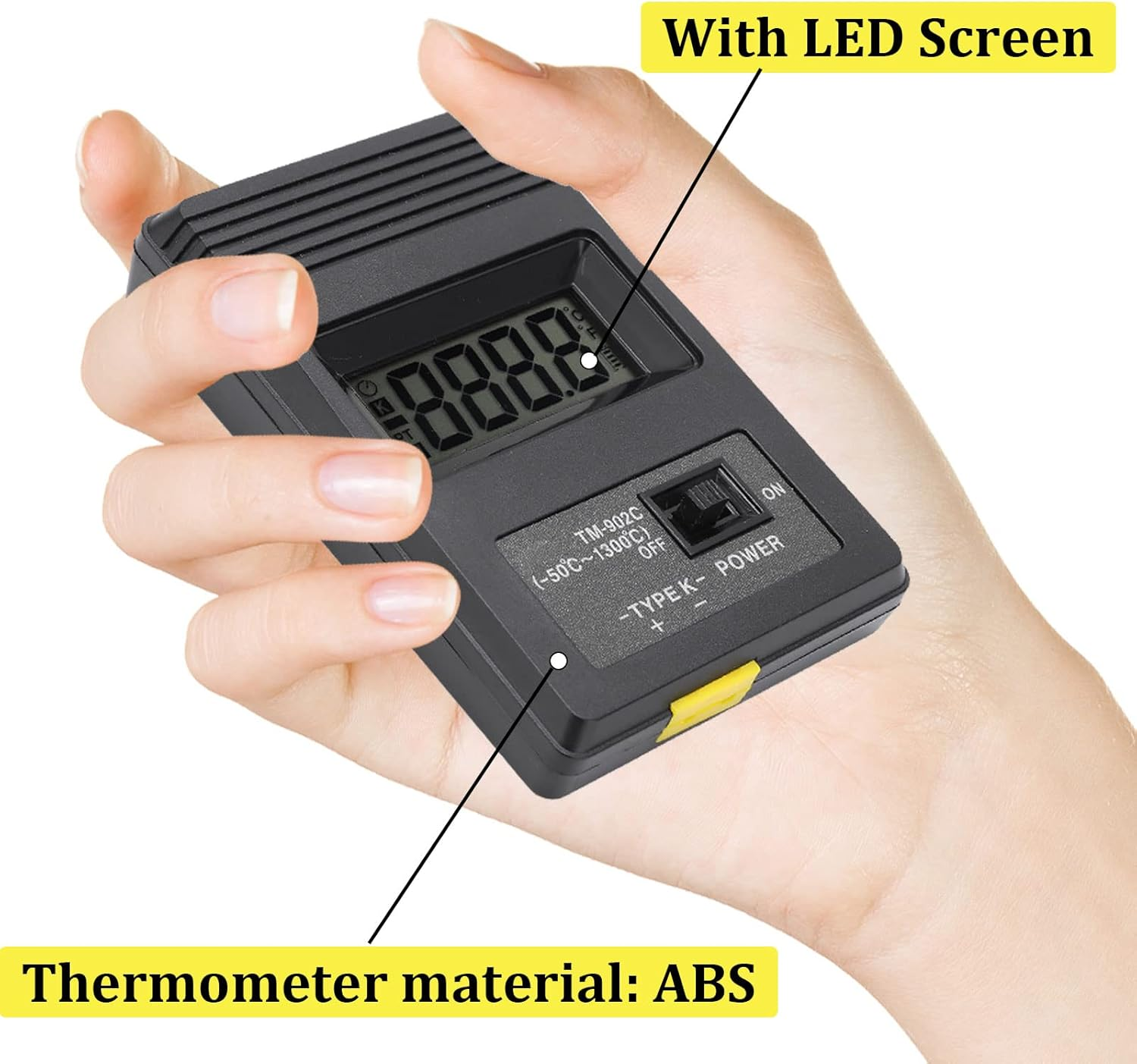 Eine Hand hält ein schwarzes Thermometer mit LED-Bildschirm und ABS-Gehäuse.