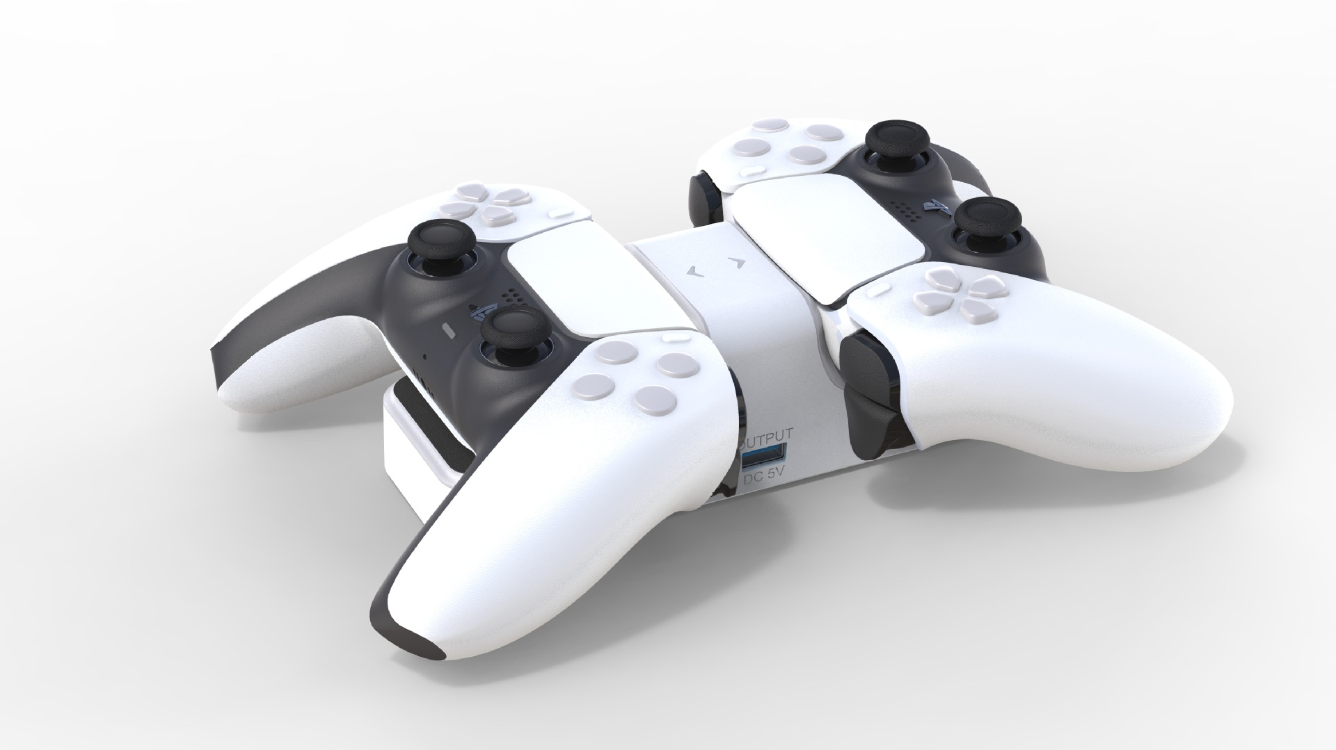 Zwei weiße und schwarze Controller sind auf einer Ladestation angebracht.