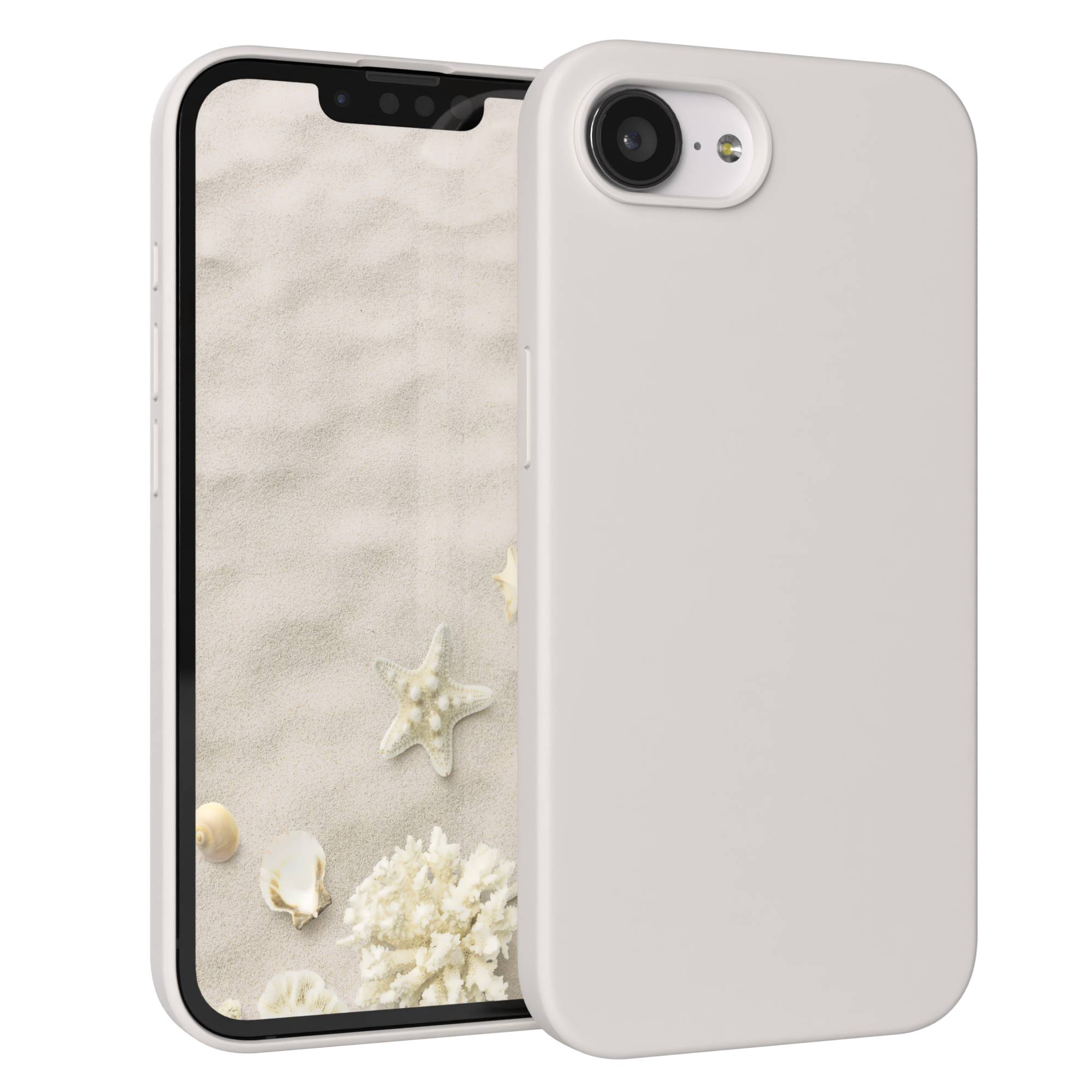 Ein hellgraues Smartphone mit einem Strandmotiv auf dem Bildschirm und Seesternen.