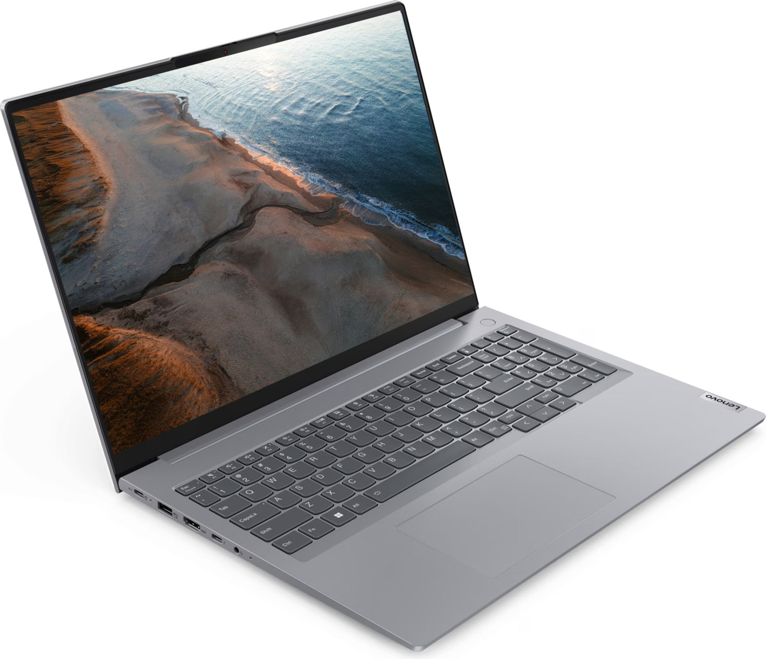Gümüş renkli Lenovo dizüstü bilgisayar açık, ekranında plaj manzarası gösteriyor. Klavye ve dokunmatik yüzey görünür.