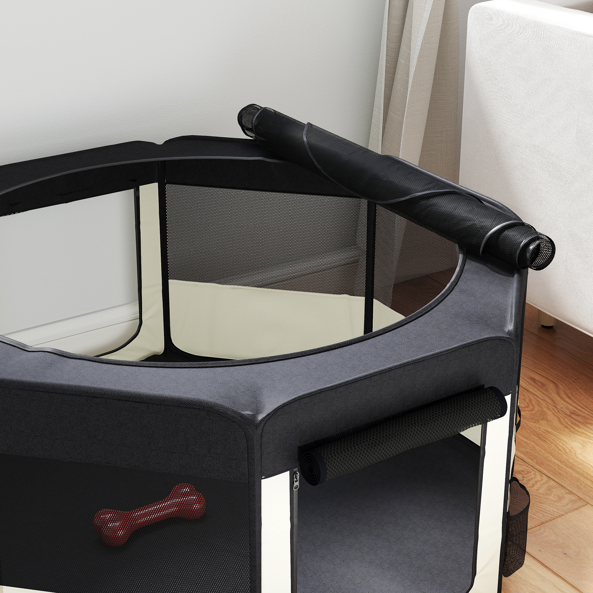 Un parque para perros hexagonal de tela con un juguete en forma de hueso dentro.