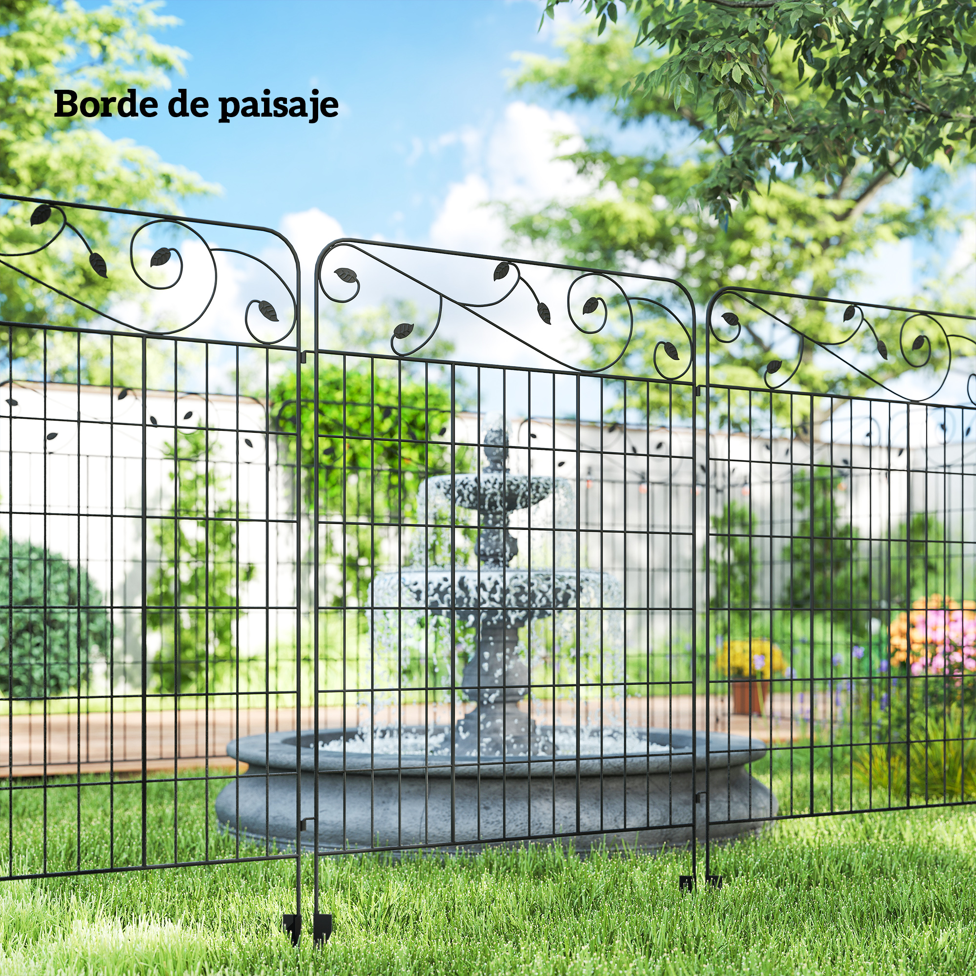 Valla de metal negra con decoración de hojas frente a un jardín con fuente.