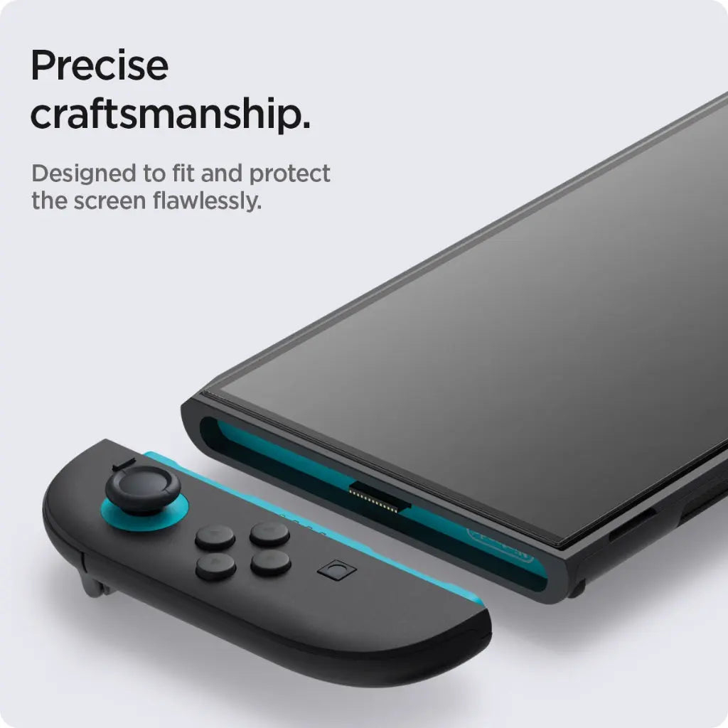 Un controller nero con accenti blu giace accanto a uno schermo scuro.