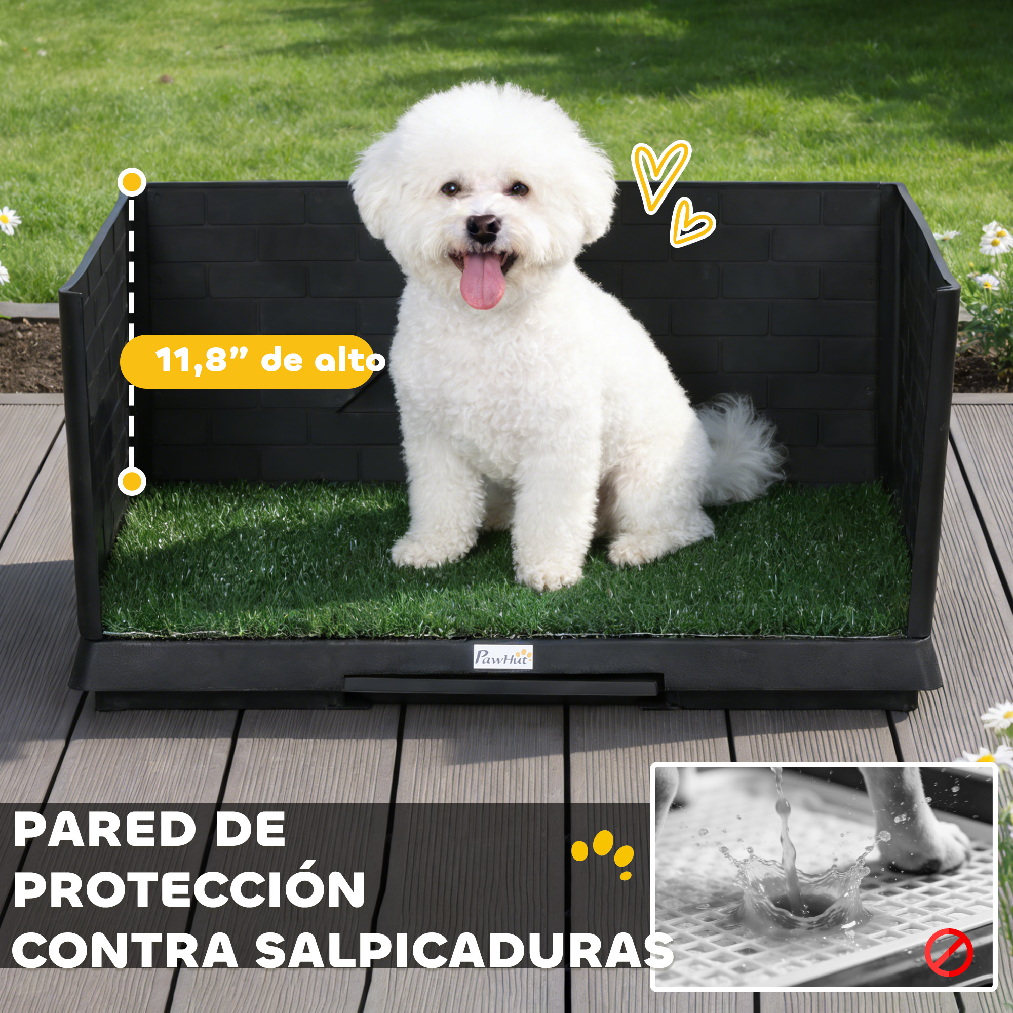 Un Bichón Frisé blanco se sienta en césped artificial dentro de un orinal para perros negro a prueba de salpicaduras.
