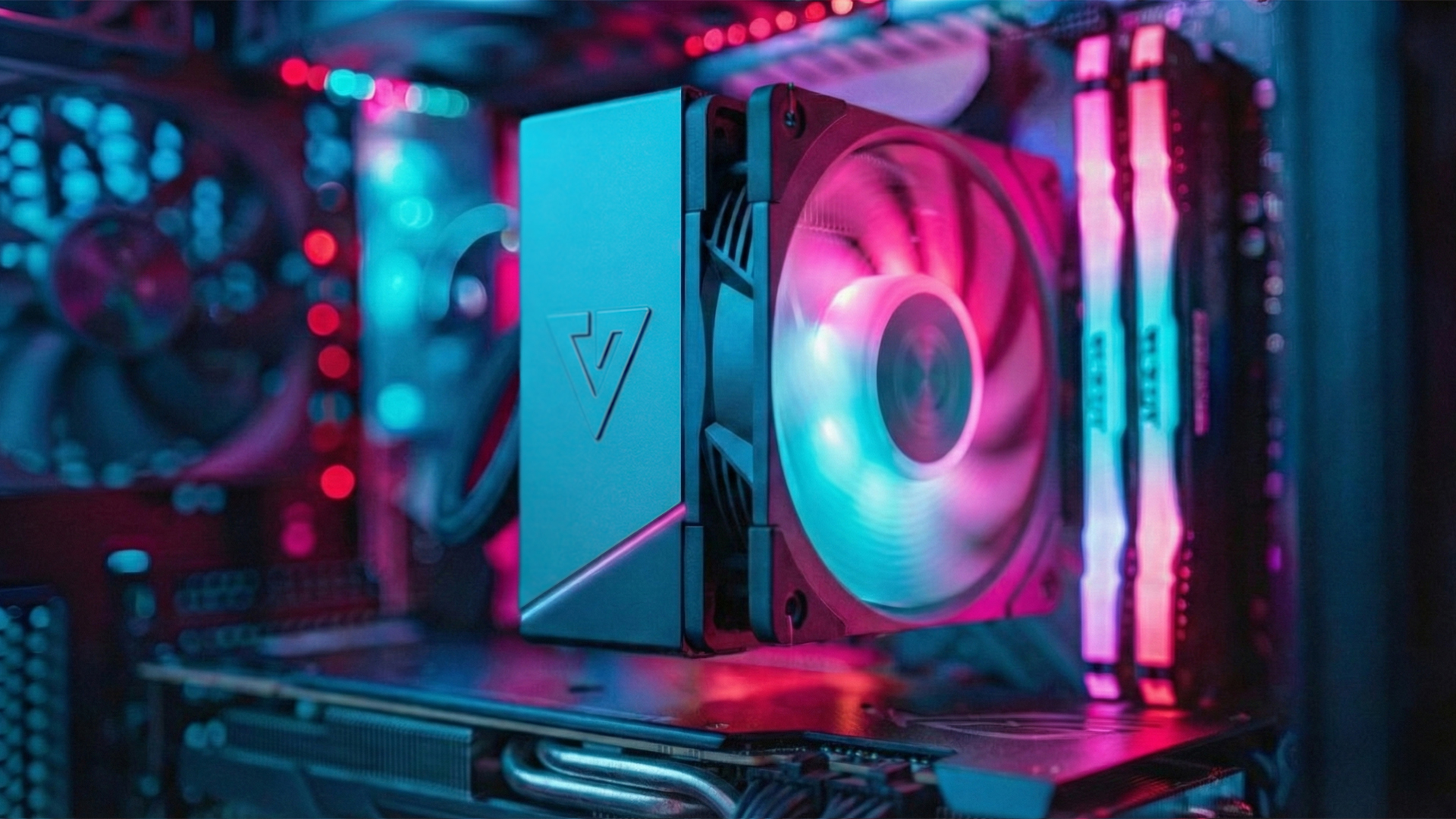 Chłodnica procesora PC z oświetleniem RGB w kolorze niebieskim i różowym.