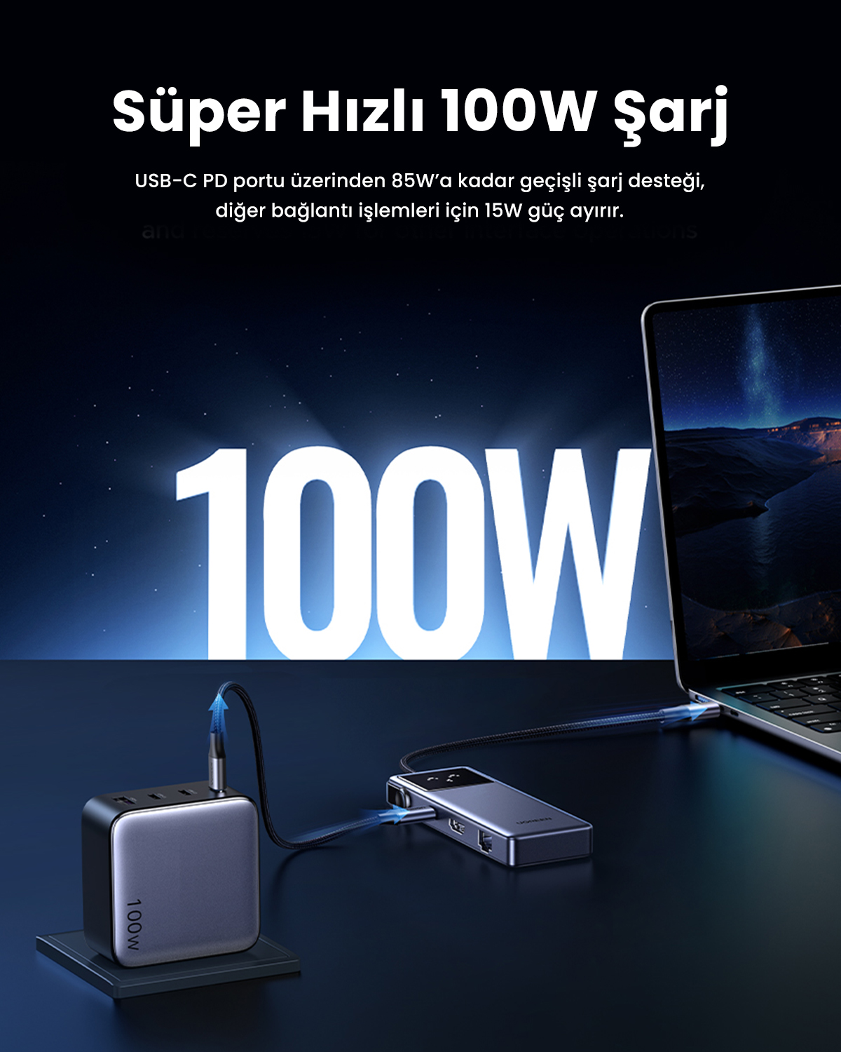 Gri 100W şarj cihazı, gri kablo ile bir dizüstü bilgisayarı şarj eder.