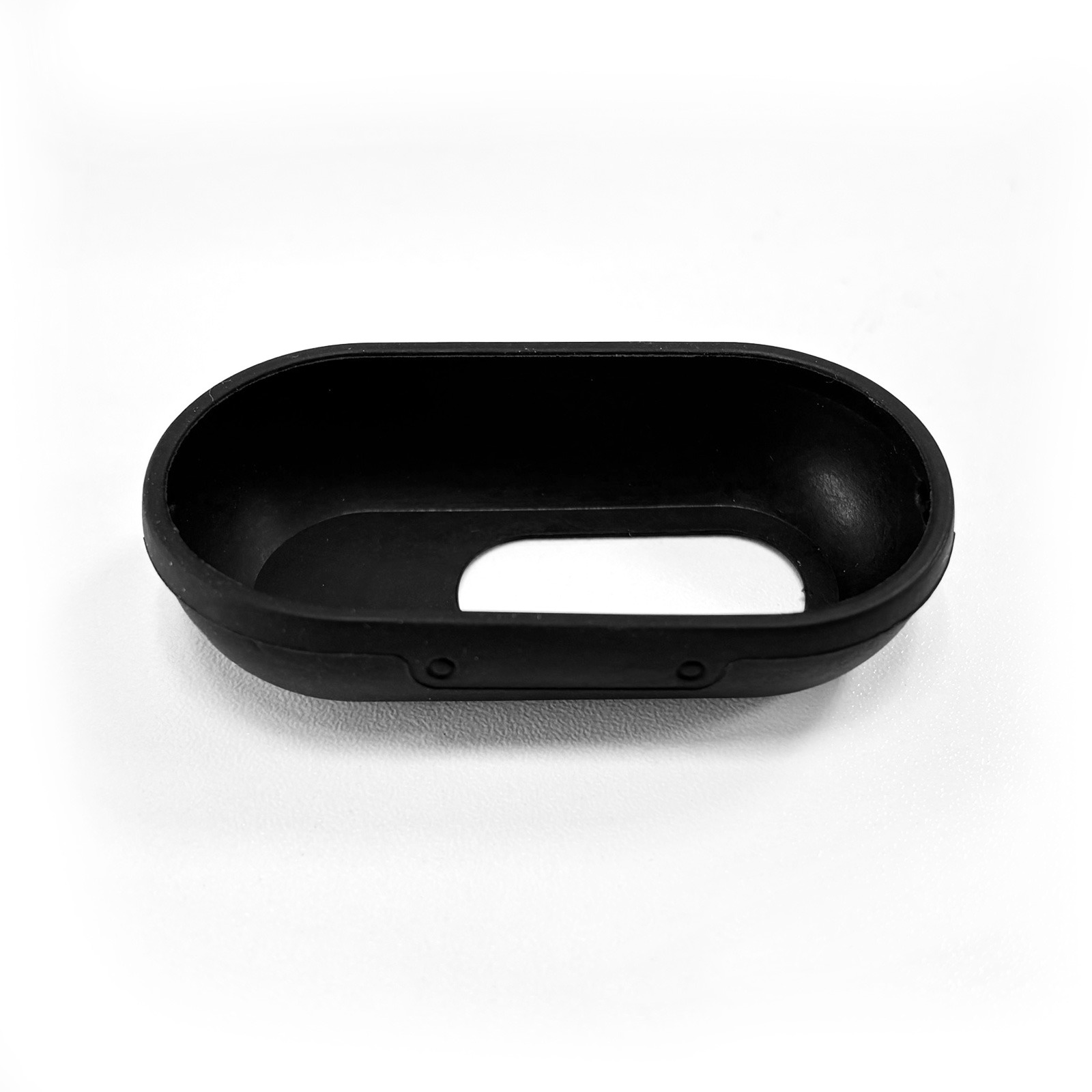 Black rubber earbud case with a cut-out in the center.
