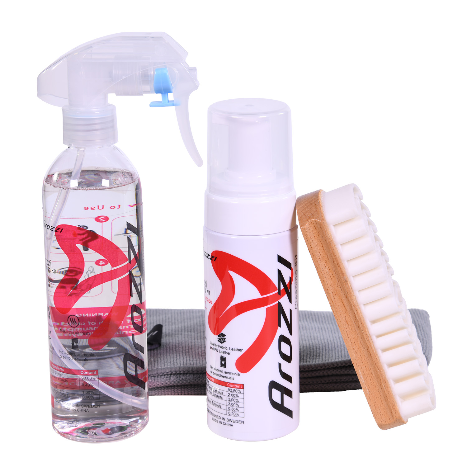 Cleaning kit with spray bottle, foam dispenser, brush, and cloth.