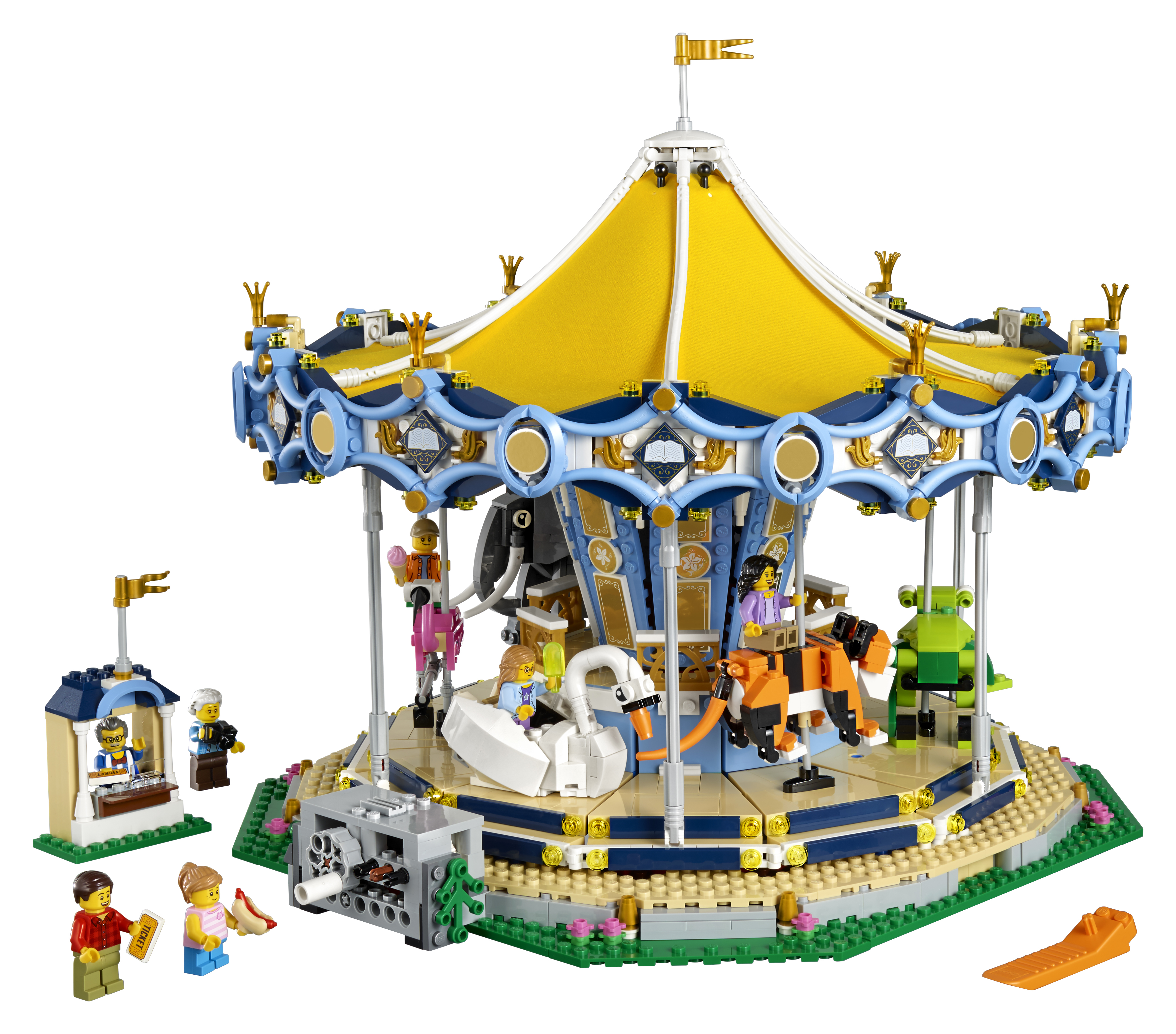 Un carrousel Lego avec des figurines, un stand de glaces et une rampe.