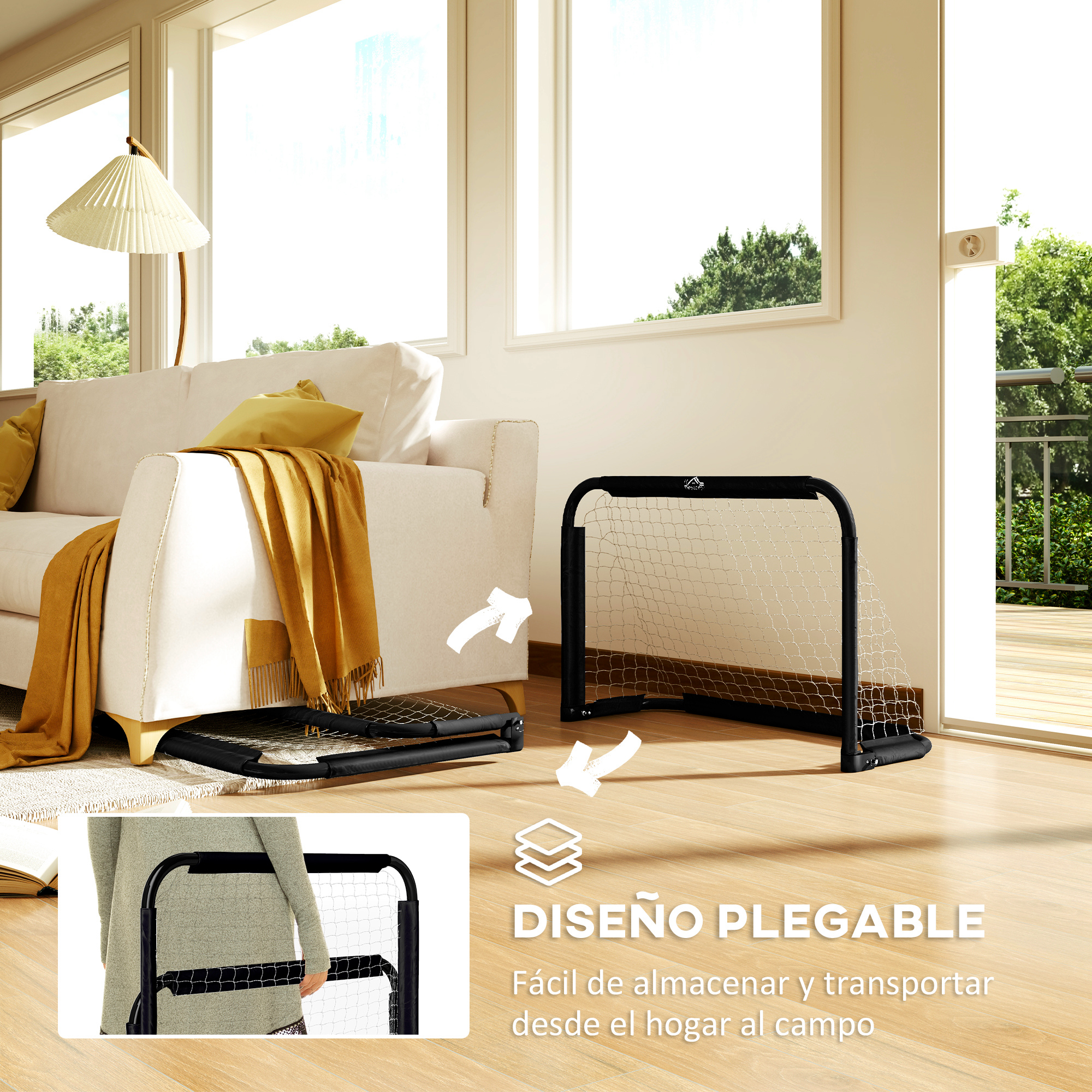 Una portería de fútbol plegable está al lado de un sofá en una habitación luminosa.