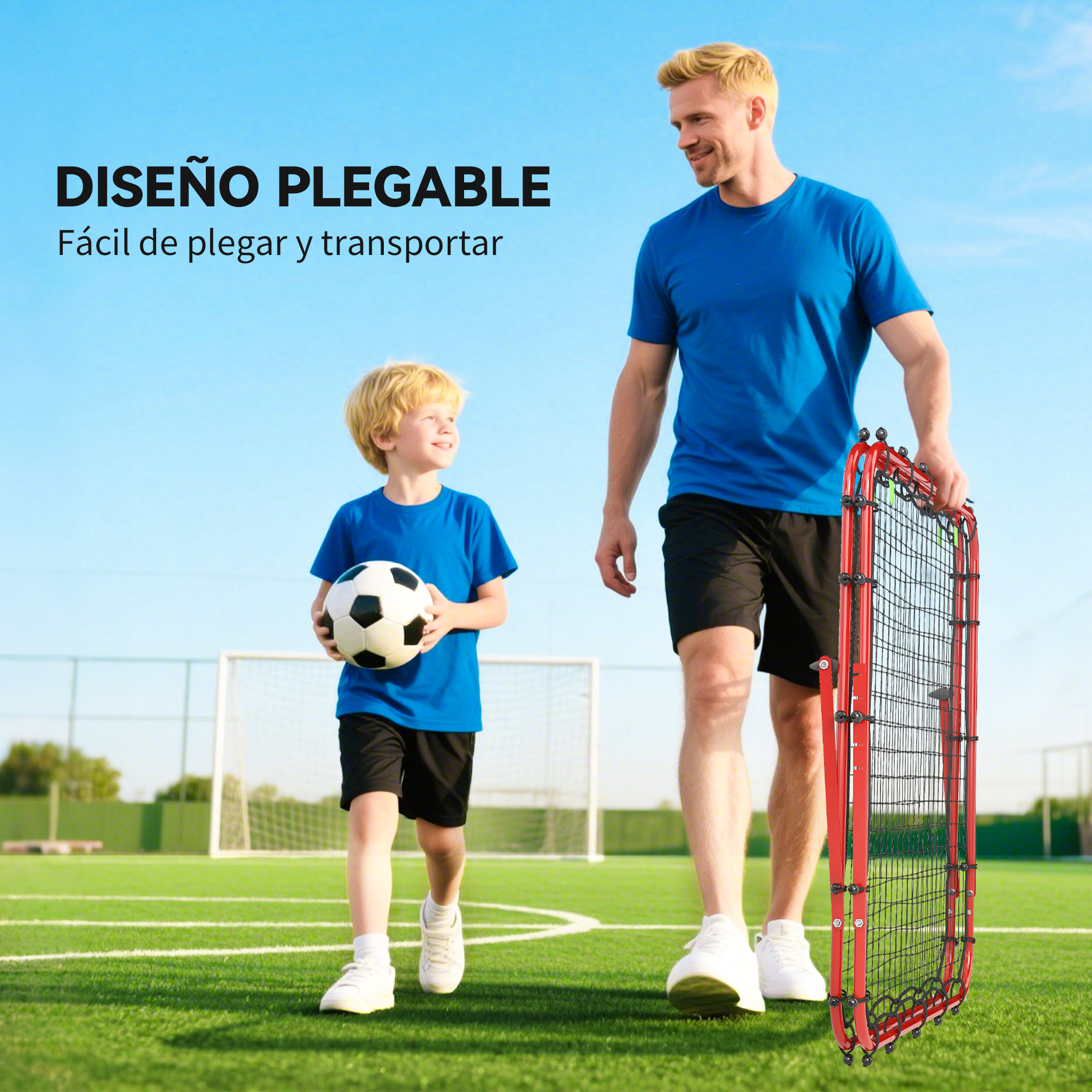 Padre e hijo en campo de fútbol, hombre lleva portería roja.