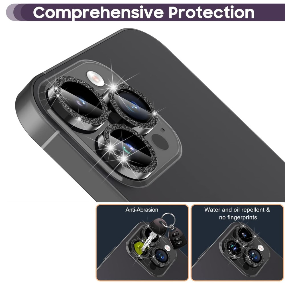 Objectifs d'appareil photo de téléphone avec protections scintillantes. Une clé à proximité.