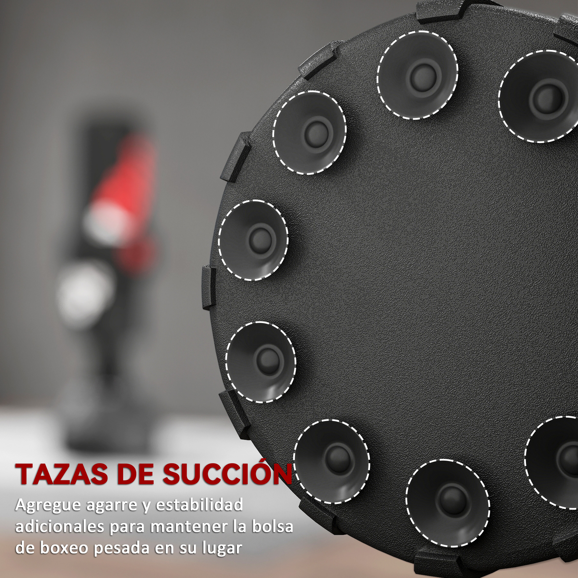 Ventosas negras con contornos blancos sobre superficie texturizada. Un saco de boxeo difuminado al fondo.