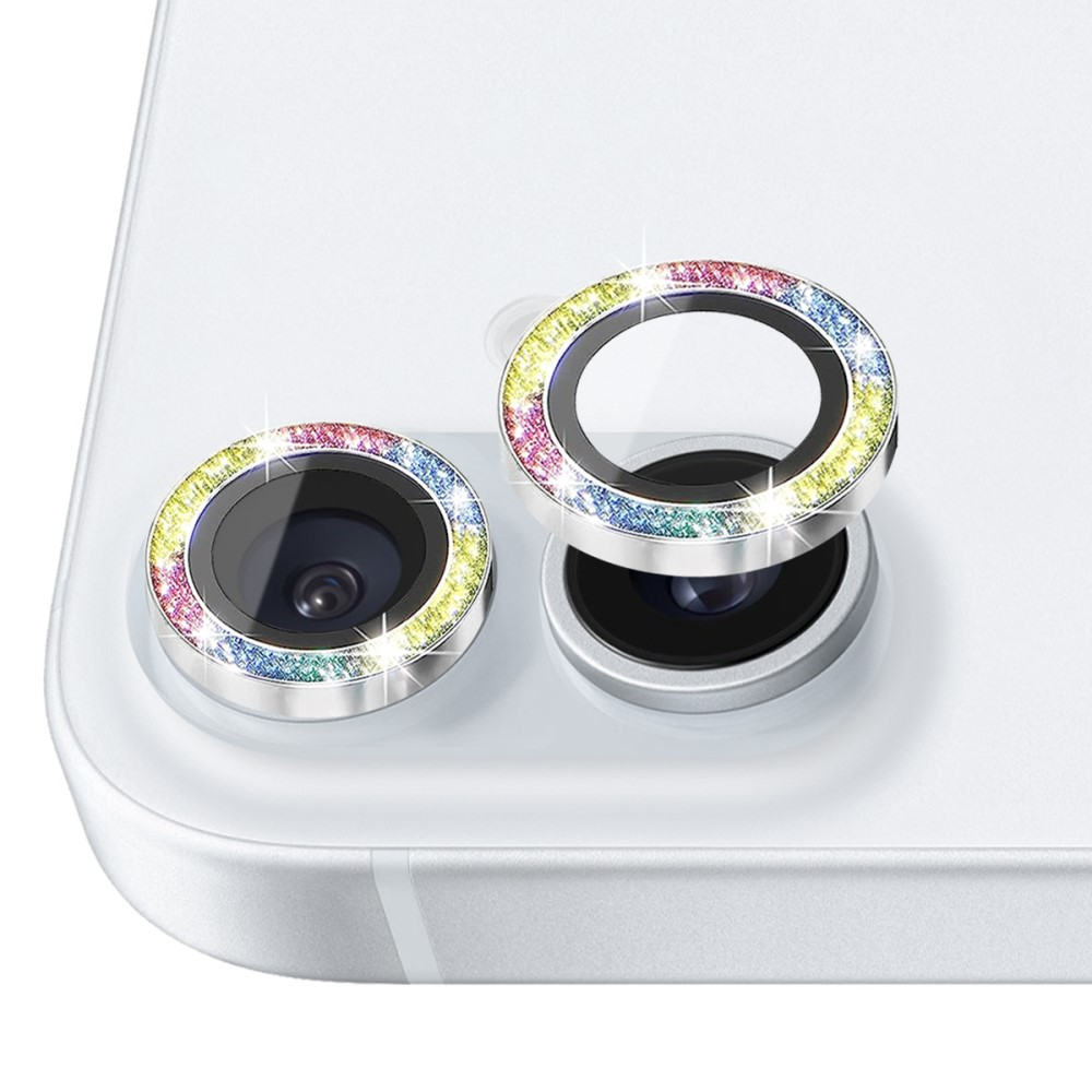 Deux protecteurs d'objectif de caméra colorés et scintillants sur un smartphone blanc.