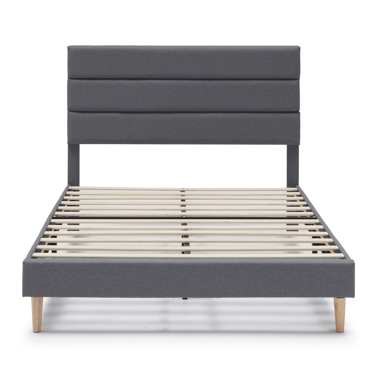 Un somier gris con base de listones y acolchado horizontal en el cabecero.