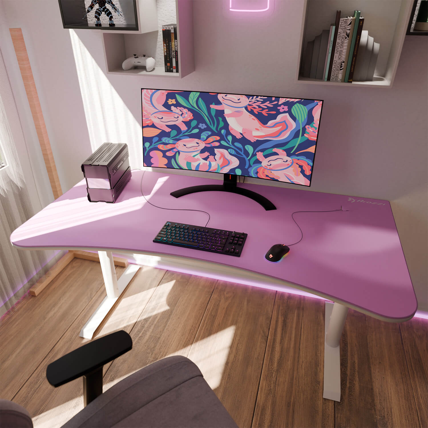 Una scrivania da gaming rosa con computer, tastiera, mouse e monitor che mostra axolotl.