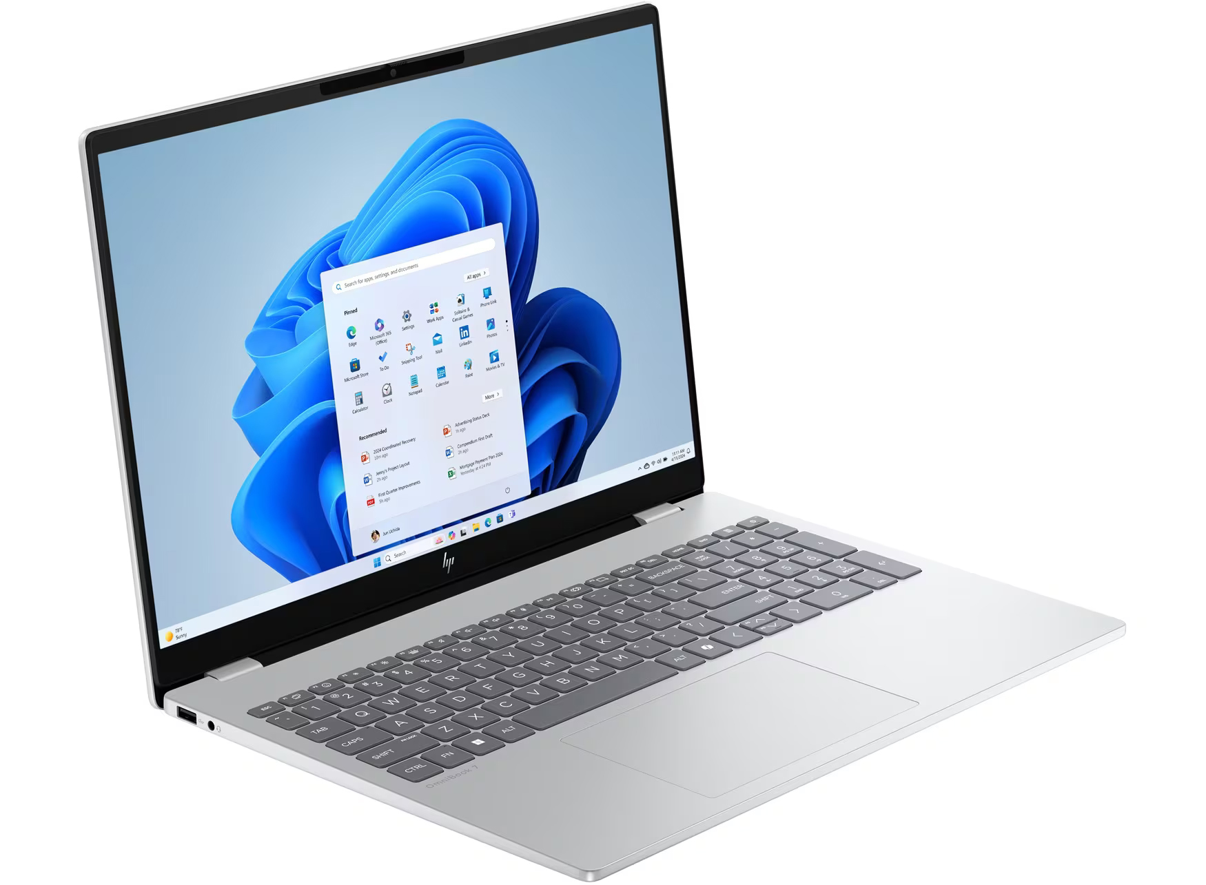 Ein silberner Laptop mit einem geöffneten Windows 11-Menü auf dem Bildschirm.