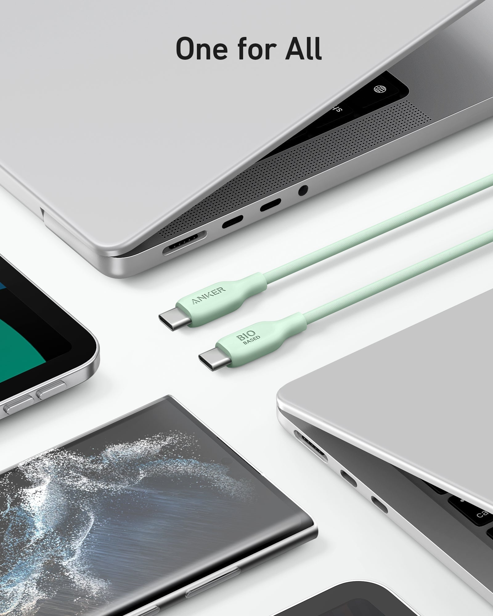 Deux câbles USB-C verts reposent près d'ordinateurs portables et de smartphones.