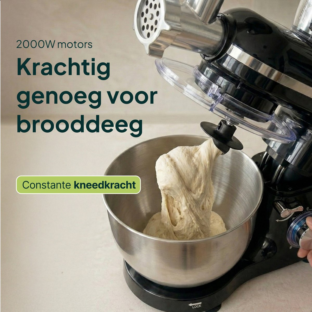 A black stand mixer with dough in a stainless steel bowl. Powerful enough for bread dough.