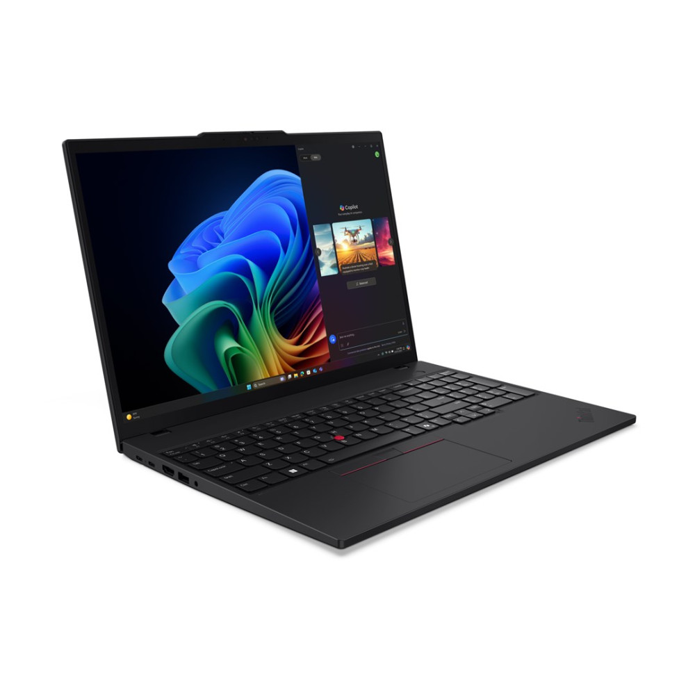 Czarny laptop z otwartym ekranem wyświetlającym kolorową abstrakcyjną tapetę.