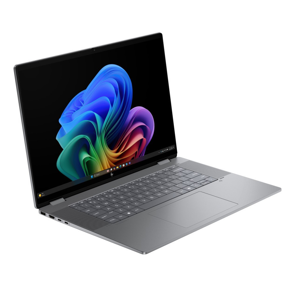 Otwarty szary laptop wyświetlający kolorową tapetę na ekranie.