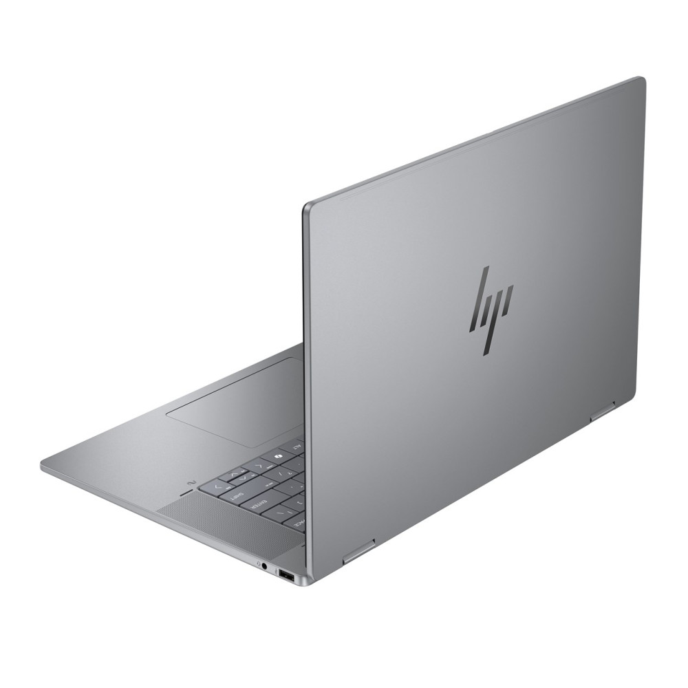 Srebrny laptop z logo HP na pokrywie, widziany z boku.
