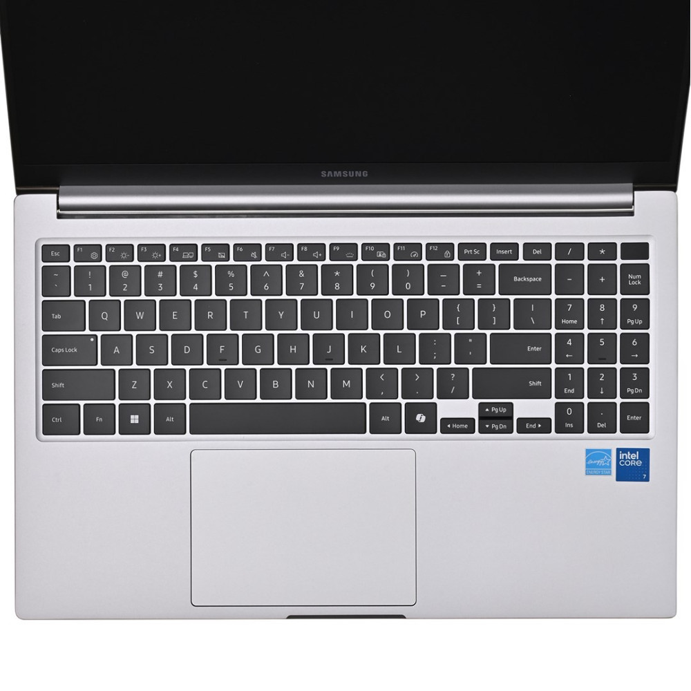 Otwarty srebrny laptop Samsung z widoczną klawiaturą i touchpadem.
