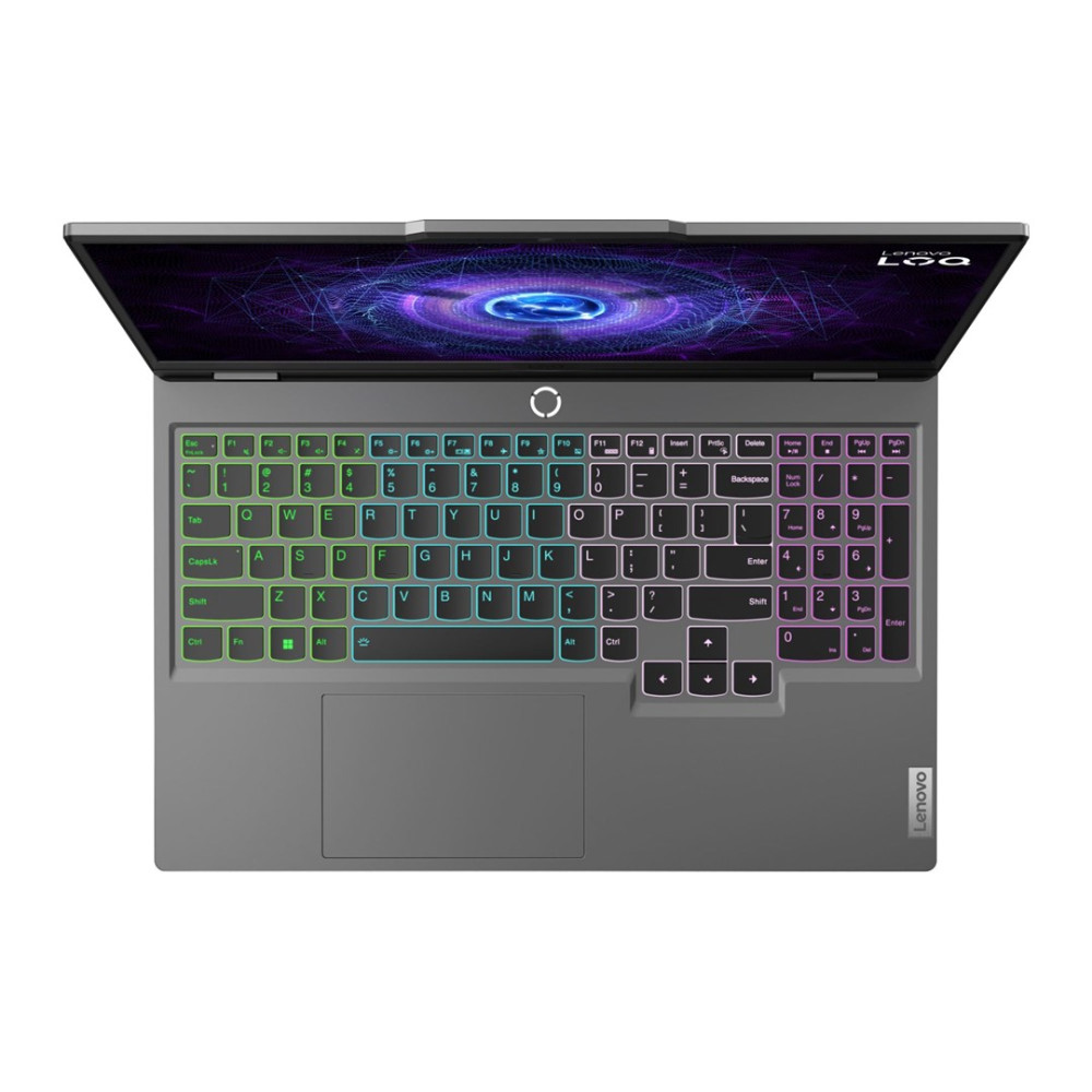 Otwarty szary laptop z podświetlaną klawiaturą i kolorową tapetą.