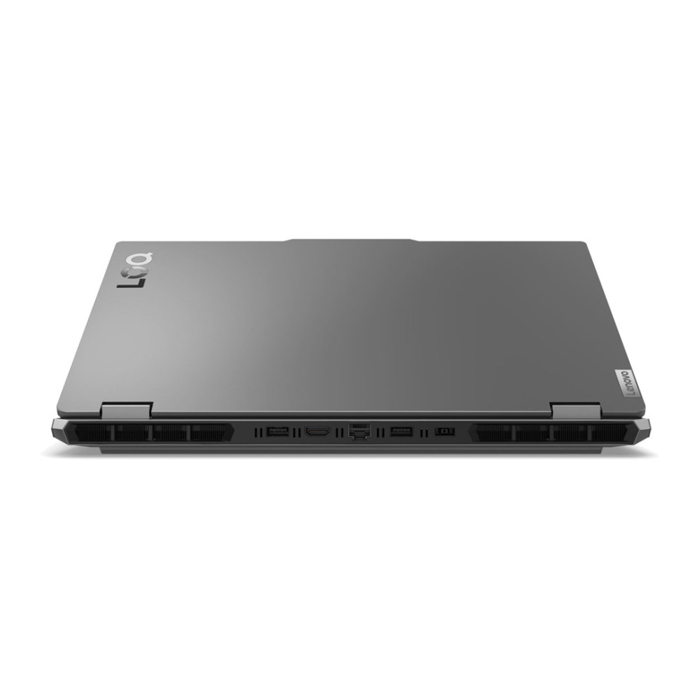 Zamknięty szary laptop z portami bocznymi i otworami wentylacyjnymi.