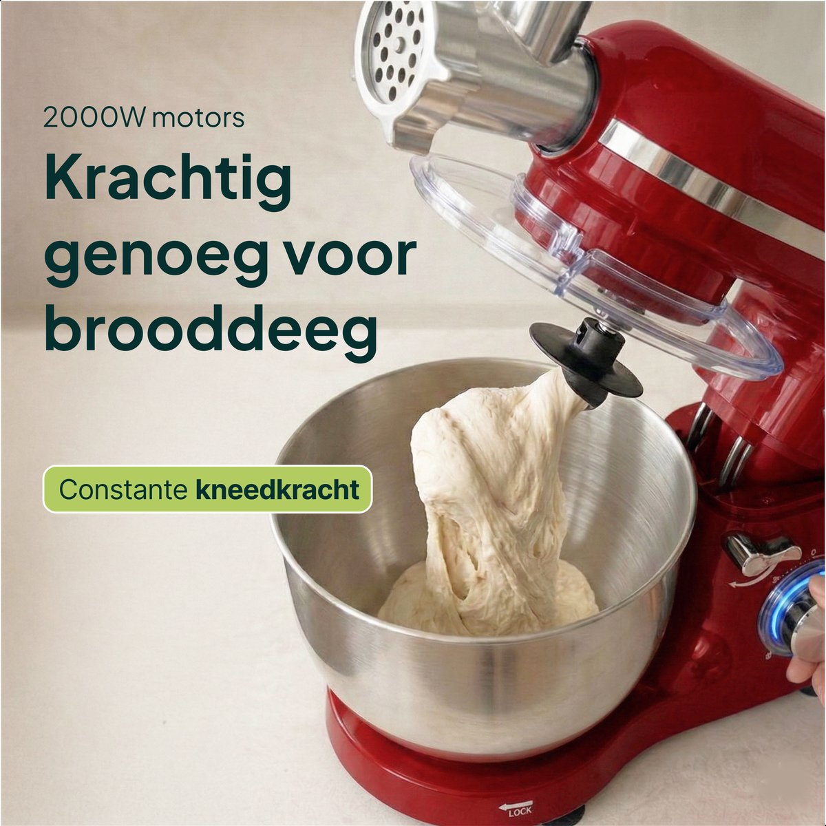 Red stand mixer with dough in a steel bowl and meat grinder attachment.