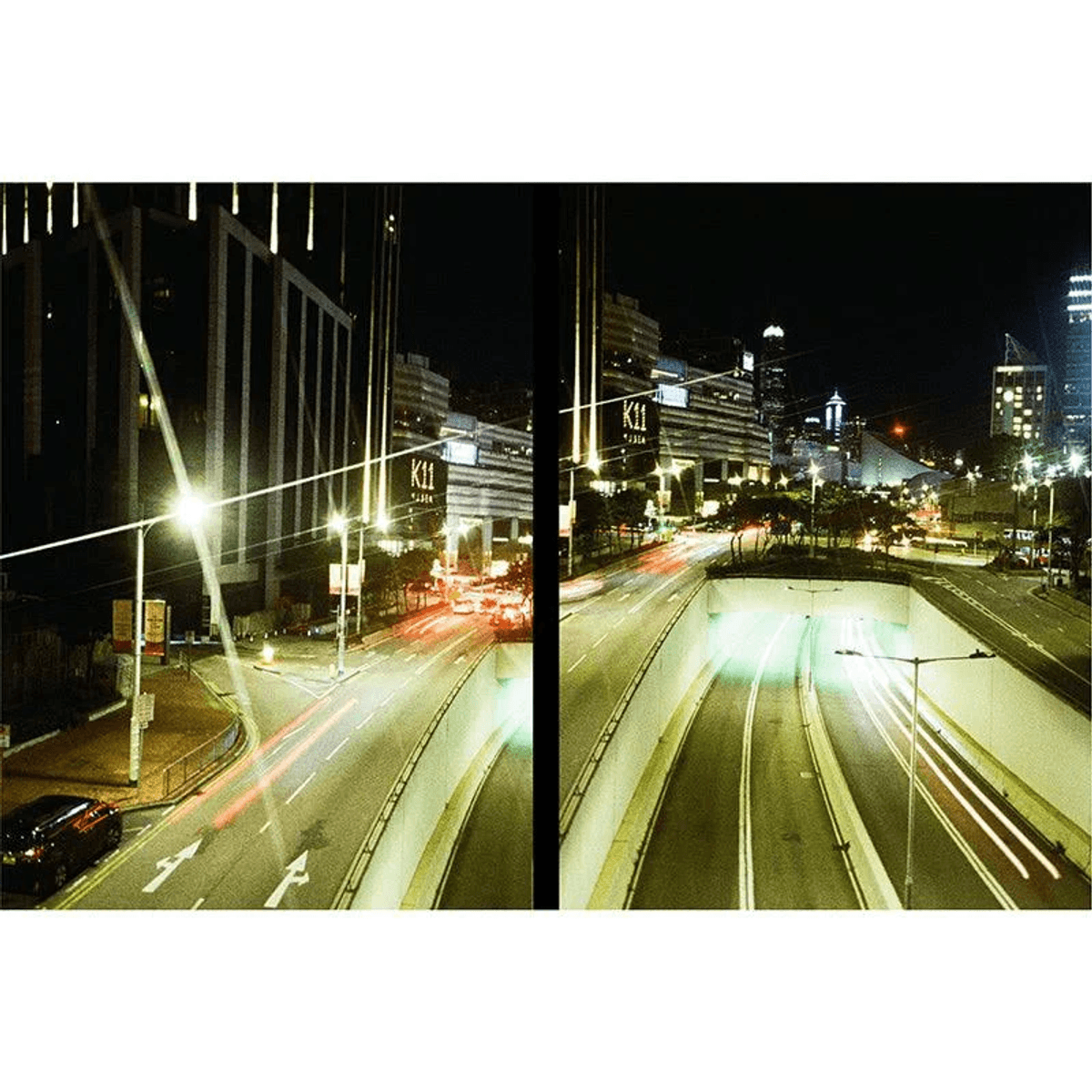 Toma nocturna de una calle de ciudad con luces de coches y edificios.