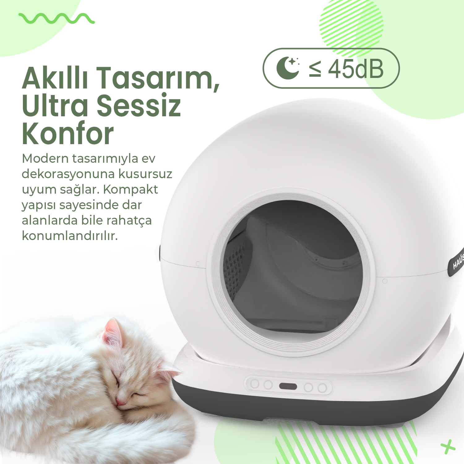 Yanında uyuyan beyaz bir kedi bulunan beyaz bir kedi tuvaleti.