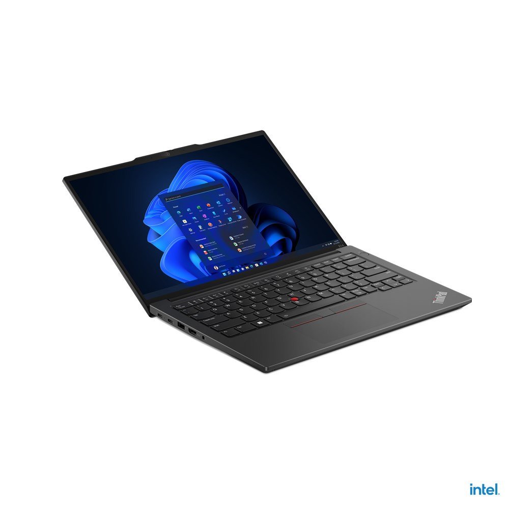 Otwarty czarny laptop z niebieską abstrakcyjną tapetą na ekranie.