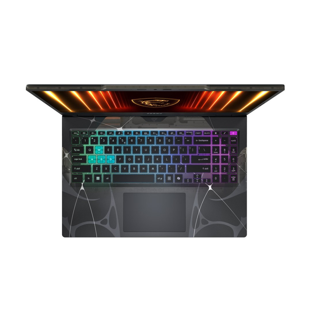 Otwarty laptop z podświetlaną klawiaturą i abstrakcyjnym wzorem na obudowie.
