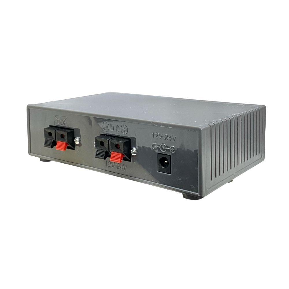 Terminal ve DC jaklı gri güç kaynağı kasası, 12V-24V etiketli.
