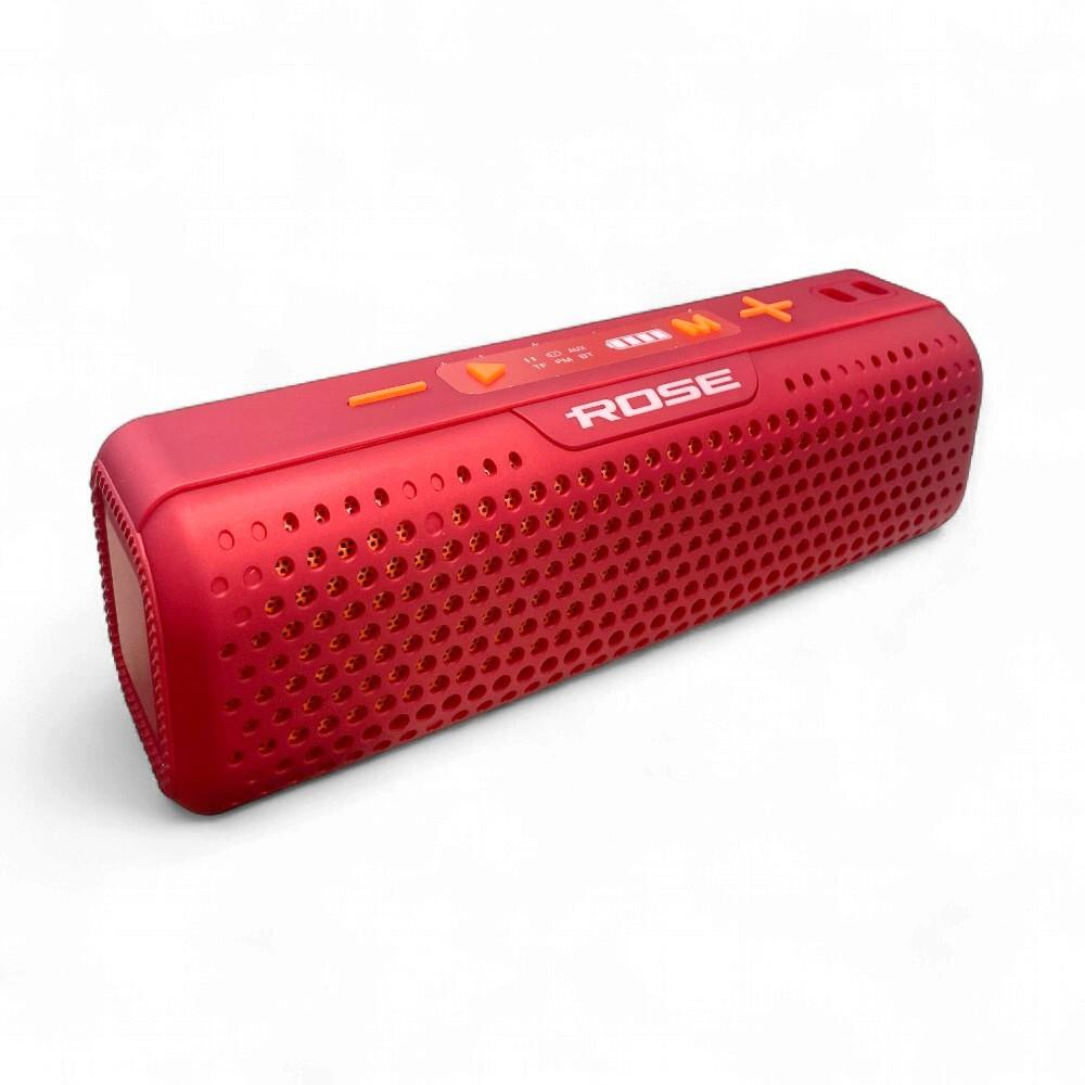 Delikli ızgaralı ve kontrol düğmeli kırmızı taşınabilir Bluetooth hoparlör.