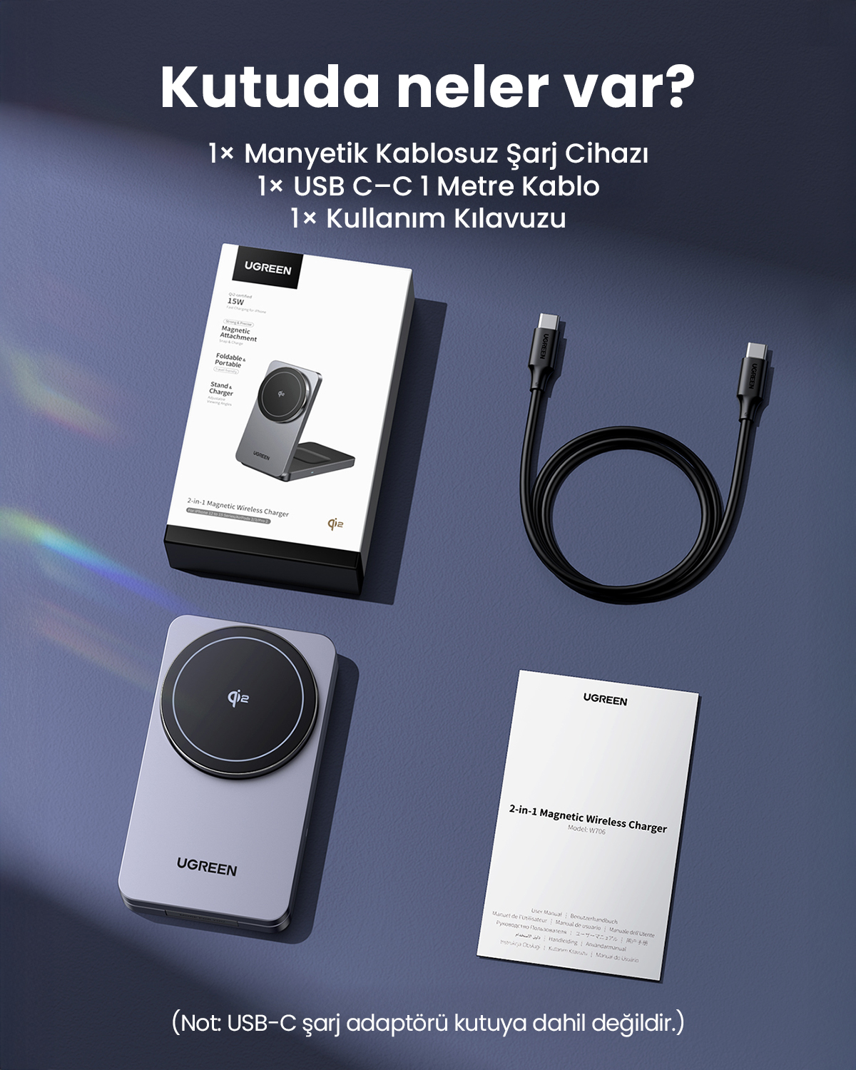 Koyu bir yüzeyde bir UGREEN kutusu, siyah bir USB-C kablosu, gri bir UGREEN kablosuz şarj cihazı ve bir kullanım kılavuzu sergileniyor.