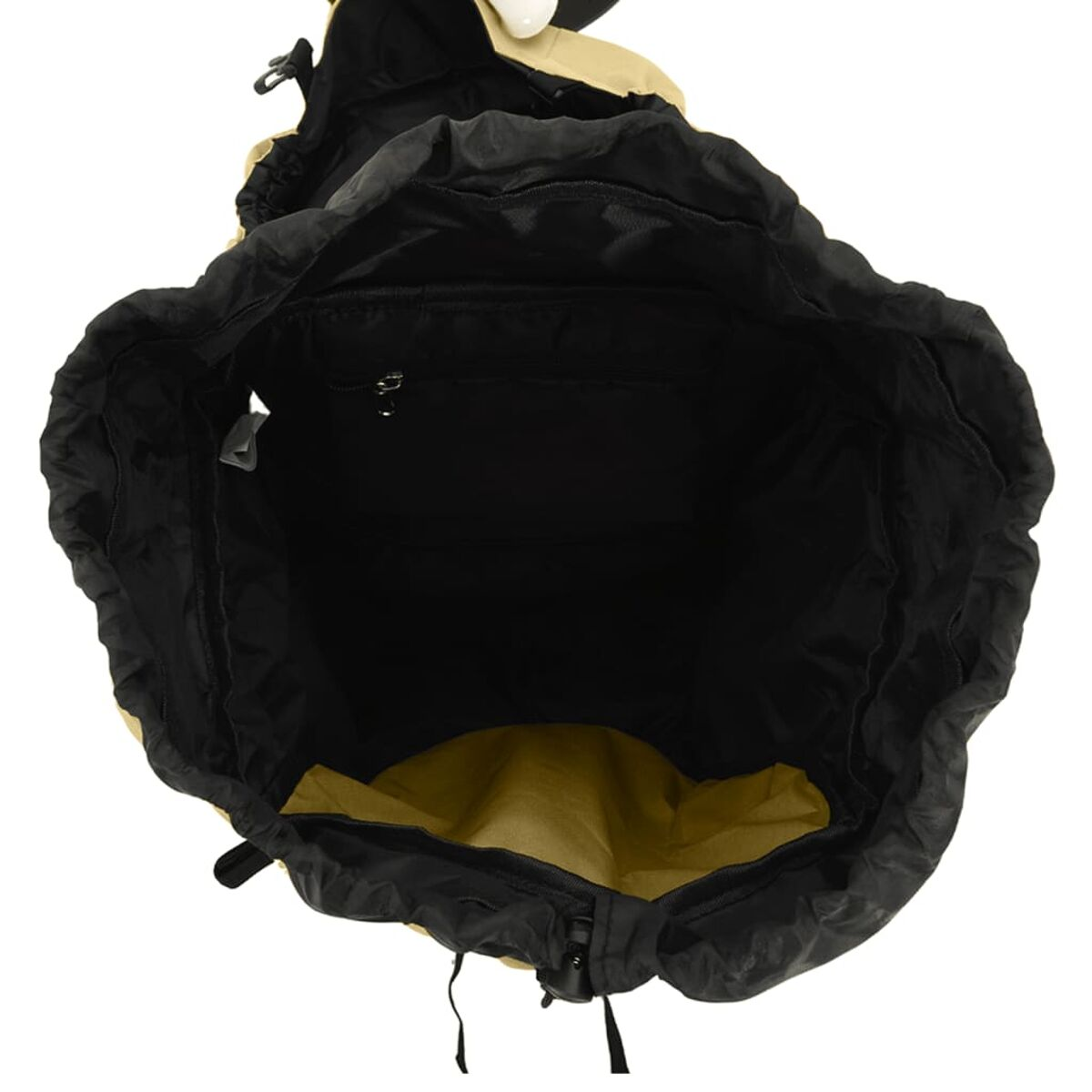 Offener Rucksack in Beige und Schwarz mit leerem Hauptfach und Innentasche.