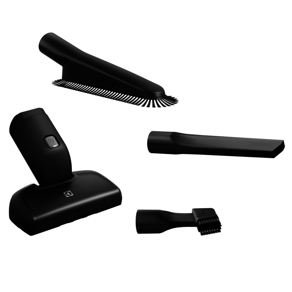 Cuatro accesorios negros para aspiradora sobre fondo blanco.