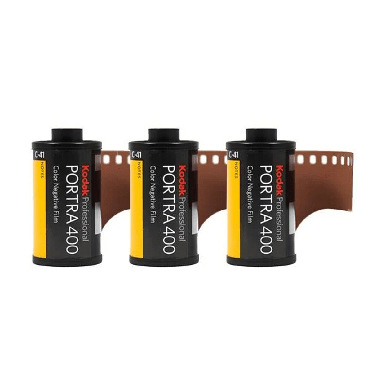 Tres rollos de película negativa de color Kodak Portra 400 uno al lado del otro.