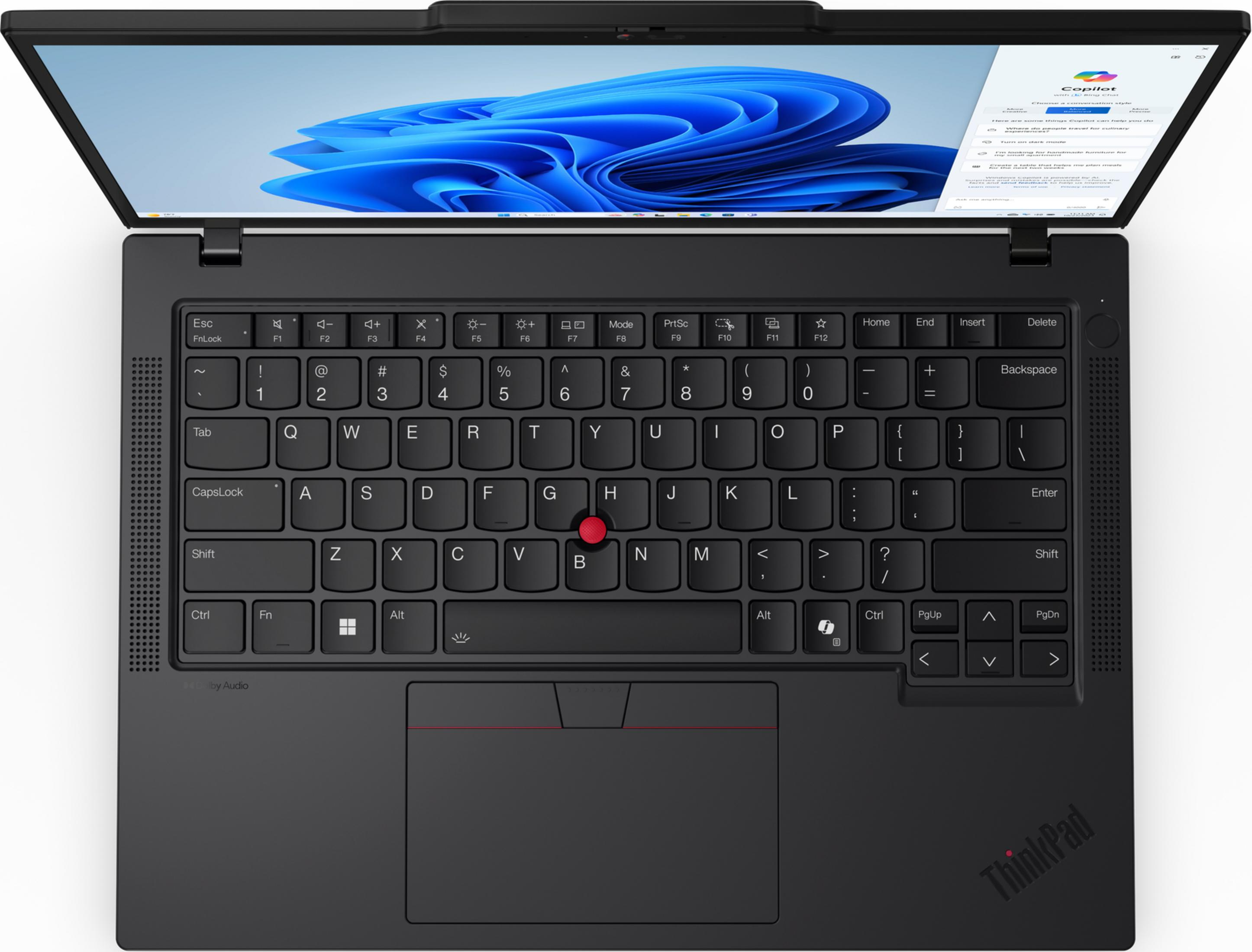 Ein geöffneter schwarzer Laptop mit beleuchteter Tastatur und blauem Hintergrundbild.