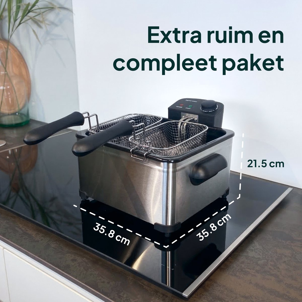 Double deep fryer on a cooktop, 35.8 cm x 35.8 cm x 21.5 cm.