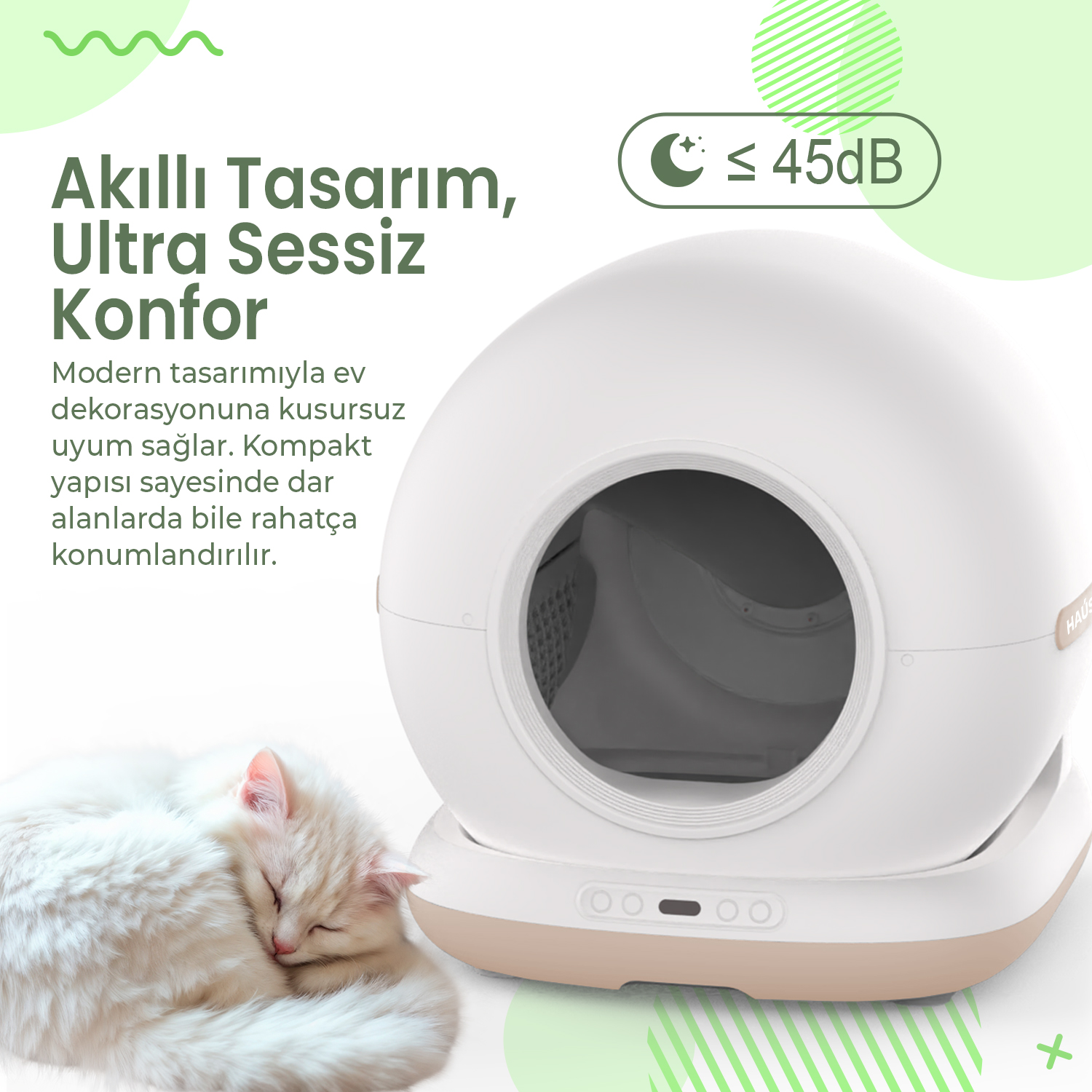 Uyuyan bir kedinin yanında beyaz otomatik kedi tuvaleti. Gürültü seviyesi 45 dB'nin altında.