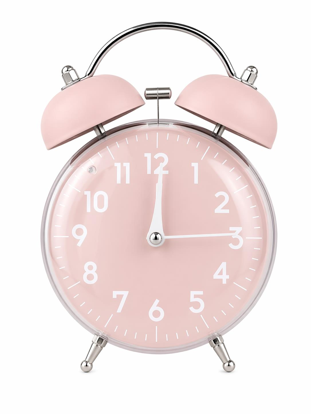Gümüş aksesuarlı pembe bir çalar saat, 12:00'ı gösteriyor.